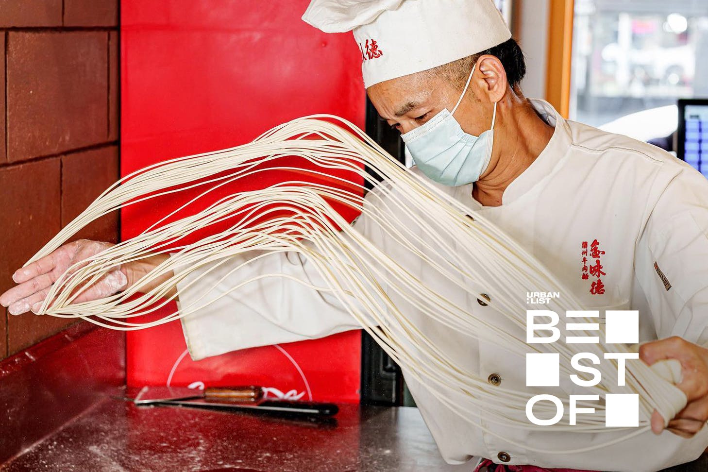 Someone creates the hand-pulled noodles at Jinweide in Auckland